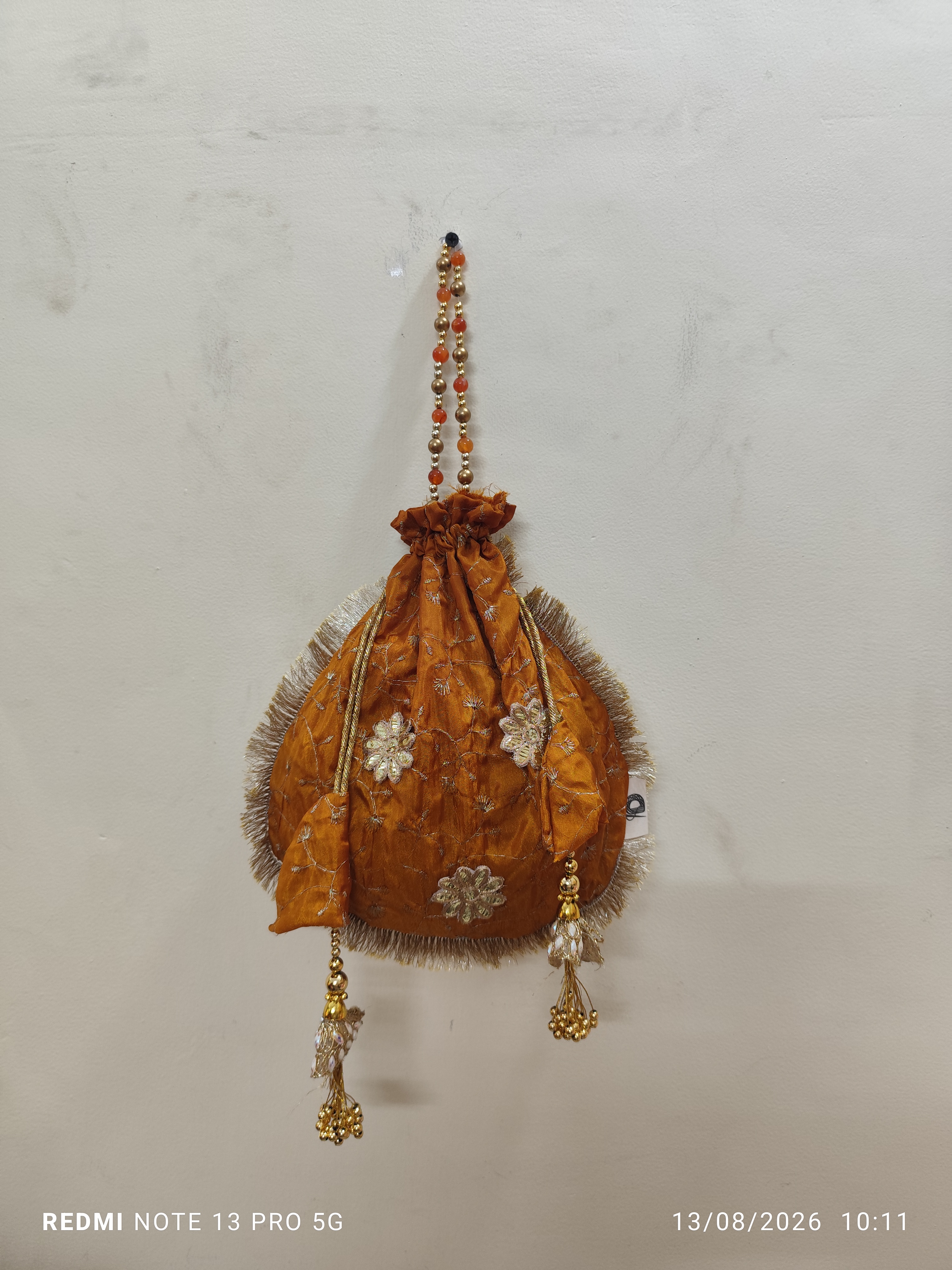 Potli DH-POT-0016 — close-up of the craft